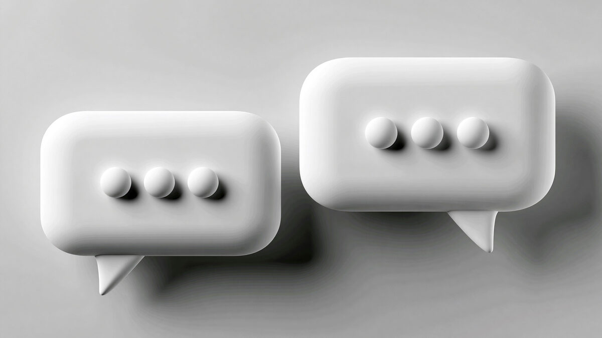 Two white 3D speech-bubble icons side by side on a grey background.