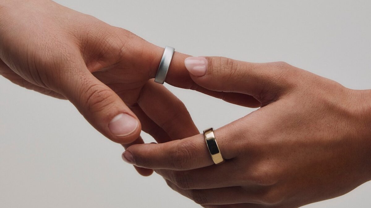 The Oura Ring 5 shown in multiple metal finishes against a neutral background