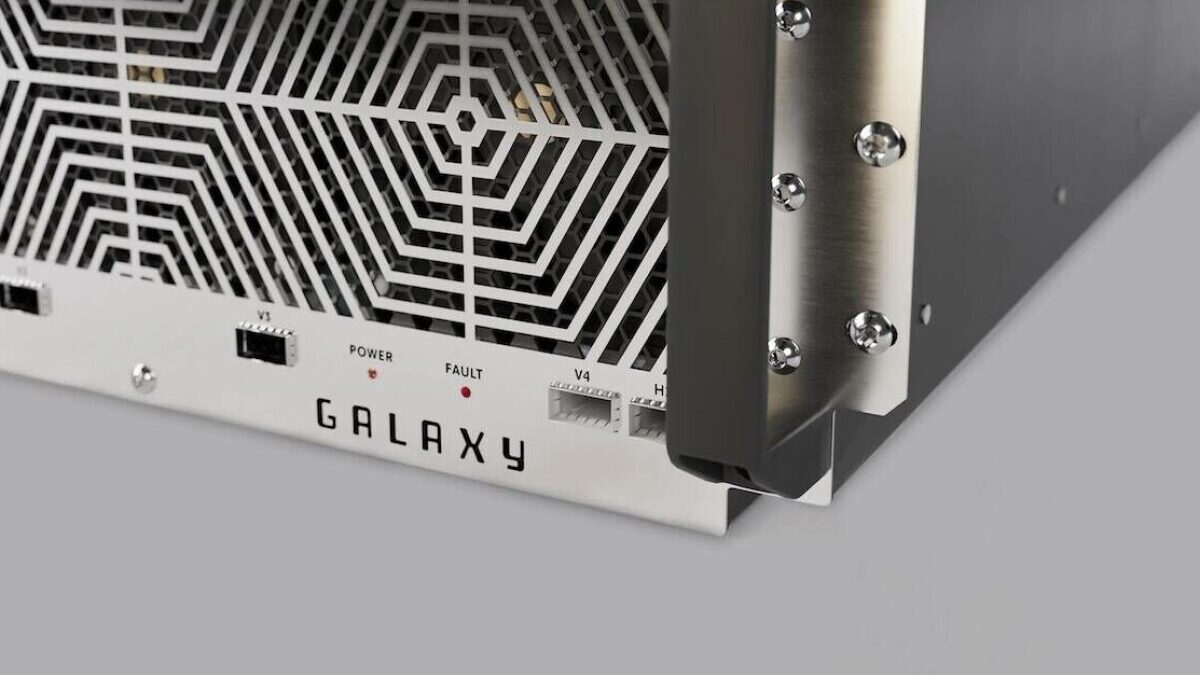 Close-up of a Tenstorrent Galaxy AI compute unit with a hexagonal vented faceplate