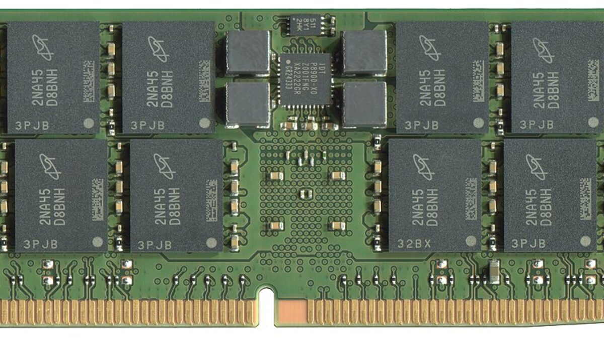 Macro photo of a Micron DDR5 memory module: eight DRAM packages marked 2NA45 D8BNH on a green circuit board above the gold contact pins