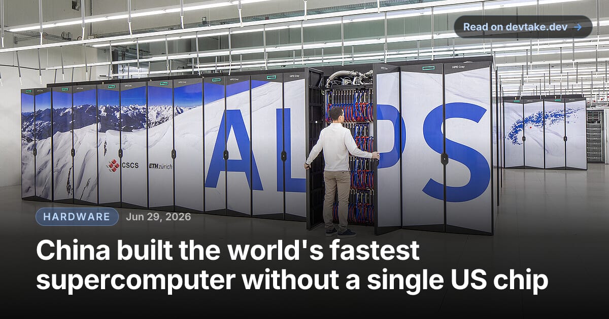 Rows of supercomputer cabinets in a data hall, a technician working at an open rack