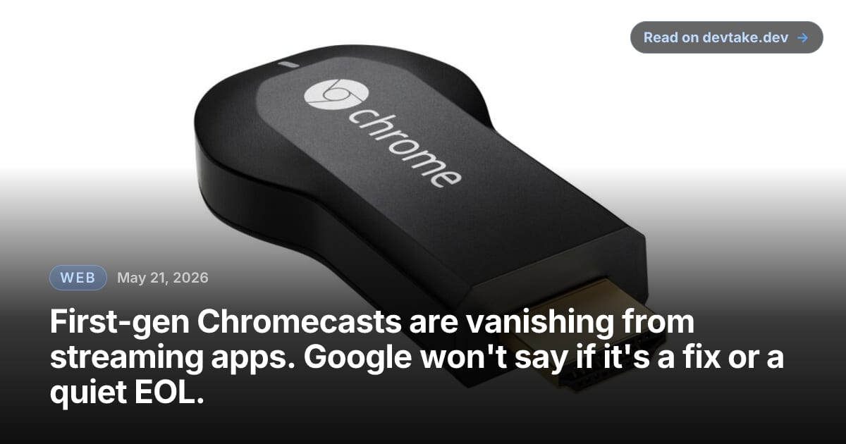 The 2013 first-generation Chromecast HDMI dongle next to its USB power cable