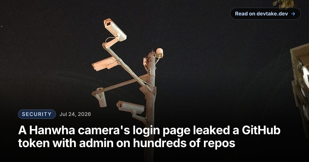 A cluster of surveillance cameras mounted on a pole at night.